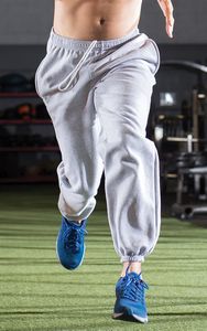 King Fashion Pocketed Sweatpants with Elastic Cuffs